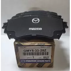 Колодки тормозные Mazda GMY53328Z Передние, Внутри
